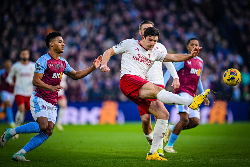 Aston Villa players in action yesterday against the Reds