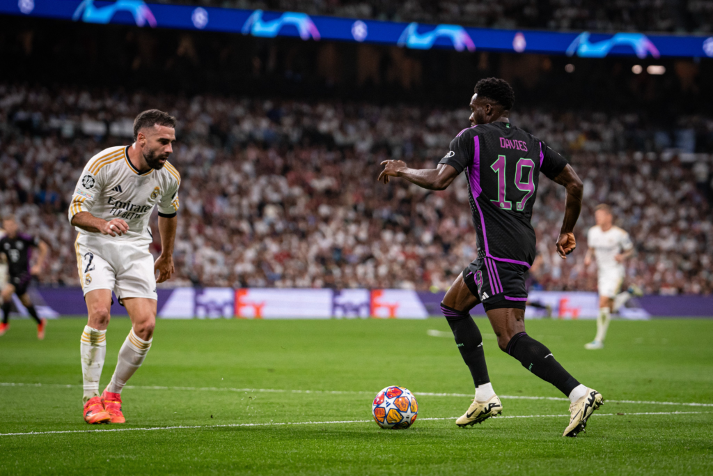 Bayern players in actions against Real Madrid
