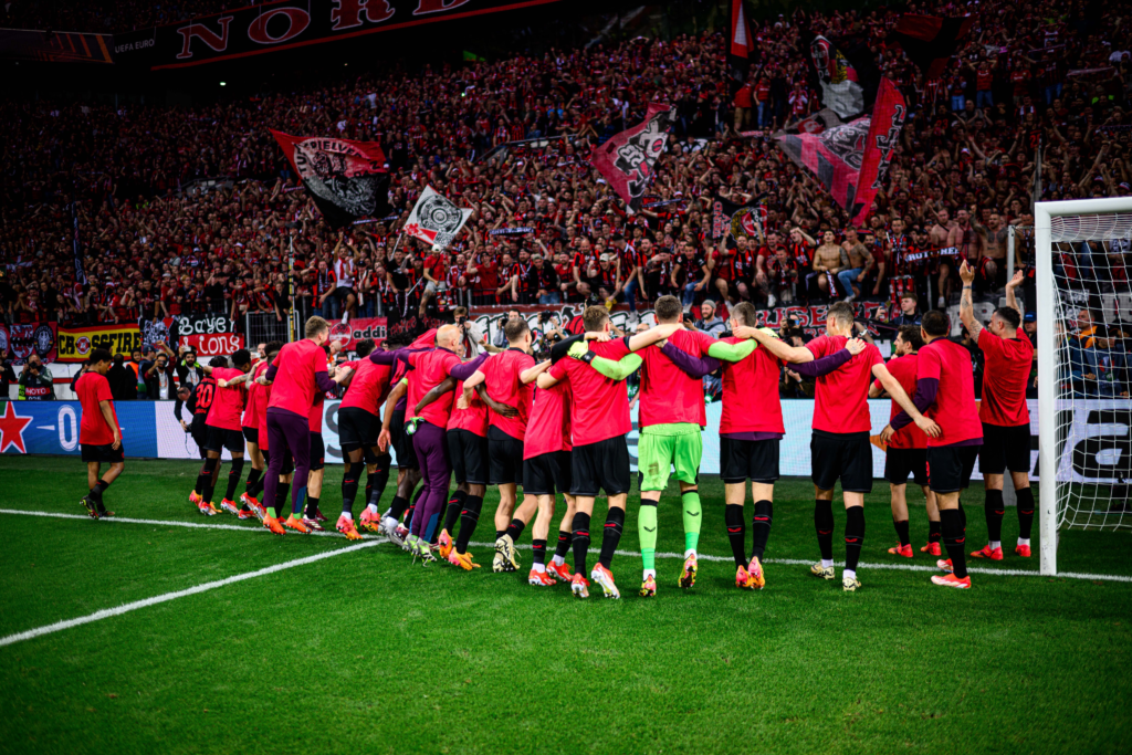 Leverkusen players celebrating after their win